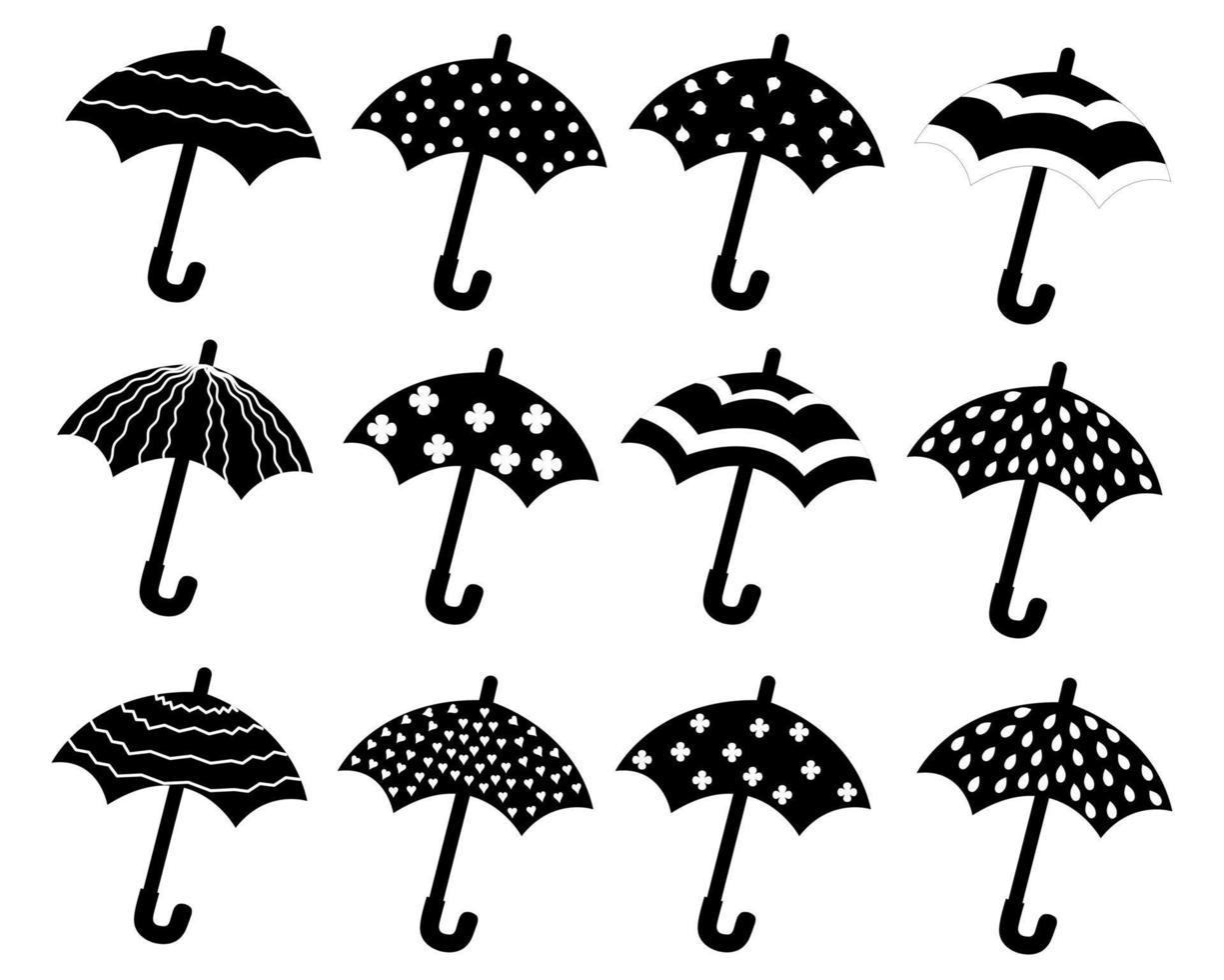 un ensemble de silhouettes de parapluies aux motifs différents. vecteur isolé sur fond blanc.