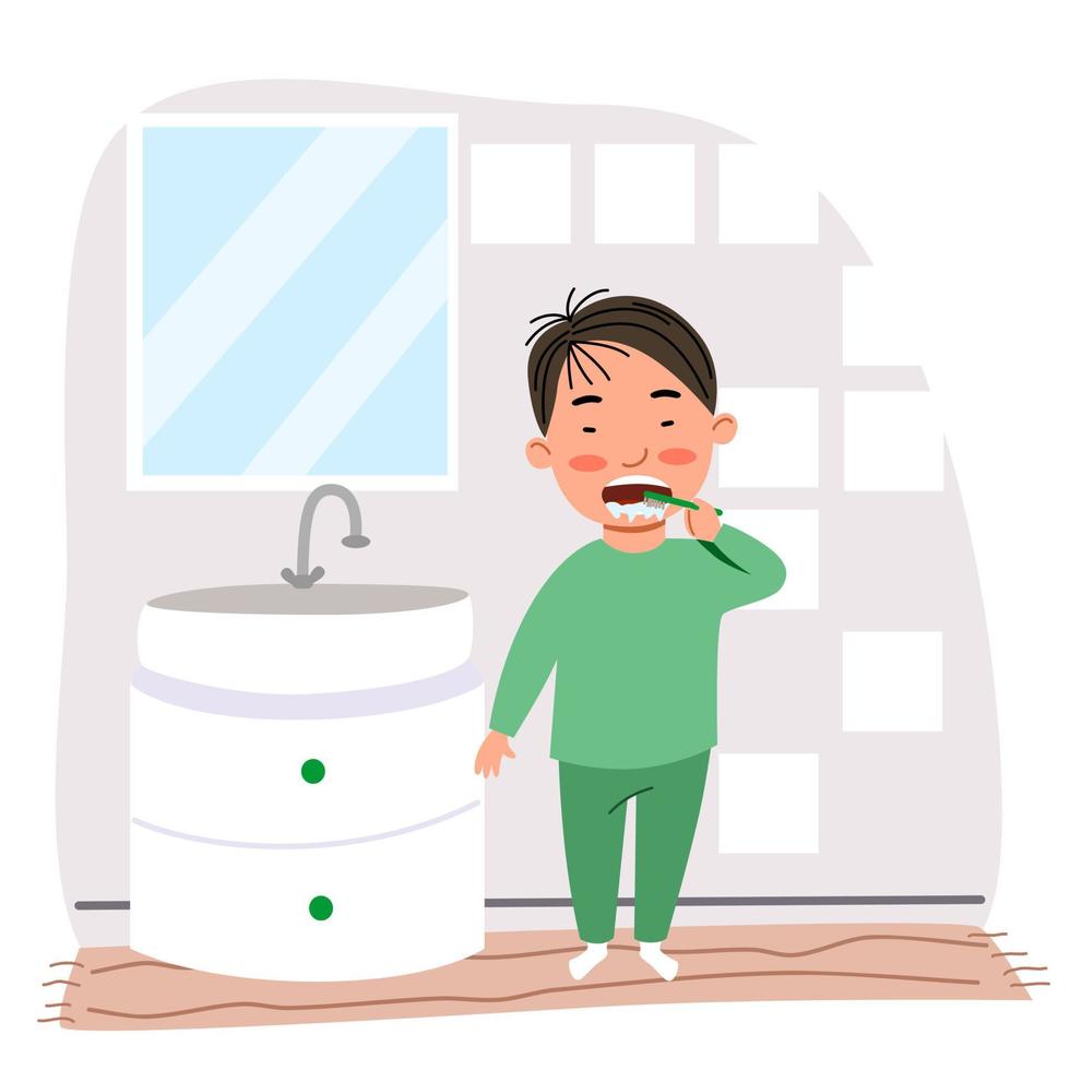 un garçon asiatique en pyjama vert se brosse les dents dans la salle de bain. vecteur