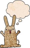 lapin de dessin animé et bulle de pensée dans le style de motif de texture grunge vecteur