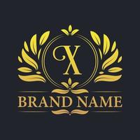 création de logo x lettre de luxe vintage doré. vecteur
