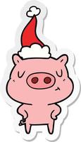 caricature d'autocollant d'un cochon de contenu portant un bonnet de noel vecteur