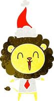 dessin animé rétro de lion qui rit d'un bonnet de noel vecteur