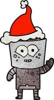 heureux dessin animé texturé d'un robot agitant bonjour portant un bonnet de noel vecteur