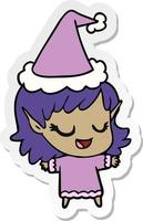 dessin animé autocollant heureux d'une fille elfe portant un bonnet de noel vecteur
