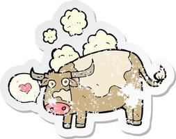 autocollant rétro en détresse d'une vache de dessin animé avec coeur d'amour vecteur