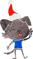 dessin animé rétro d'un chien qui sort la langue portant un bonnet de noel vecteur