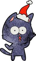 drôle de bande dessinée texturée d'un chat portant un bonnet de noel vecteur