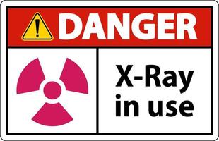 signe de danger x-ray en cours d'utilisation sur fond blanc vecteur