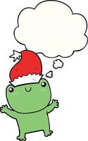 grenouille de dessin animé mignon portant un chapeau de noël et une bulle de pensée vecteur