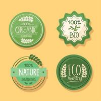 quatre icônes d'étiquettes écologiques vecteur