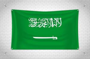 drapeau de l'arabie saoudite accroché au mur de briques. dessin 3d. drapeau accroché au mur. dessiner soigneusement en groupes sur des calques séparés pour une édition facile. vecteur