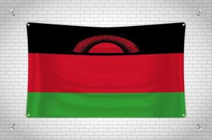 drapeau malawi accroché au mur de briques. dessin 3d. drapeau accroché au mur. dessiner soigneusement en groupes sur des calques séparés pour une édition facile. vecteur