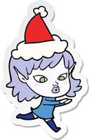 jolie caricature d'autocollant d'une fille elfe portant un bonnet de noel vecteur