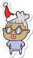 caricature d'autocollant d'une femme bibliothécaire portant des lunettes portant un bonnet de noel vecteur