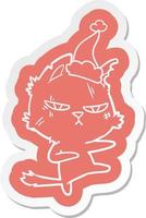 autocollant de dessin animé dur d'un chat portant un bonnet de noel vecteur
