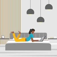 jeune femme afro-américaine allongée dans son lit et utilisant un ordinateur portable à la maison vecteur