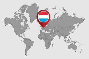 épinglez la carte avec le drapeau luxembourgeois sur la carte du monde. illustration vectorielle. vecteur