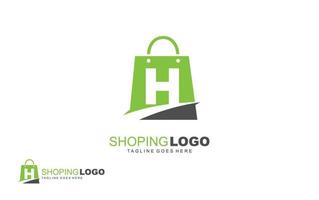 h logo boutique en ligne pour la société de marque. illustration vectorielle de modèle de sac pour votre marque. vecteur