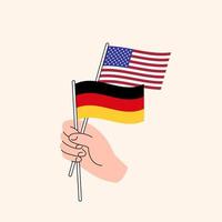 main de dessin animé tenant des drapeaux américains et allemands. relations entre nous et l'Allemagne. concept de diplomatie, de politique et de négociations démocratiques. design plat vecteur isolé