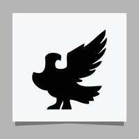 l'aigle noir vectoriel sur papier blanc est parfait pour les logos, les illustrations, les bannières, les dépliants, les fonds d'écran