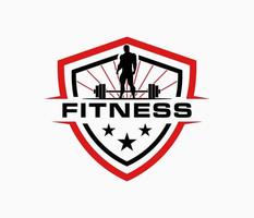 studio de conception de logo de gym fitness avec vecteur de conception de bouclier symbole homme muscle