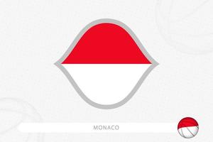 drapeau de monaco pour la compétition de basket-ball sur fond gris de basket-ball. vecteur