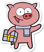 autocollant d'un cochon joyeux avec un cadeau de Noël vecteur