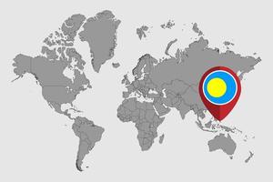 épinglez la carte avec le drapeau de palau sur la carte du monde. illustration vectorielle. vecteur