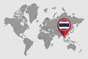 épinglez la carte avec le drapeau de la thaïlande sur la carte du monde. illustration vectorielle. vecteur