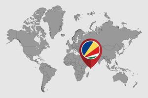 épinglez la carte avec le drapeau des seychelles sur la carte du monde. illustration vectorielle. vecteur