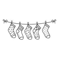 chaussettes pour enfants sur une corde, contour noir, illustration vectorielle vecteur