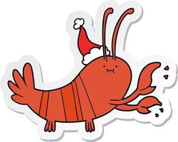 caricature d'autocollant d'un homard portant un bonnet de noel vecteur