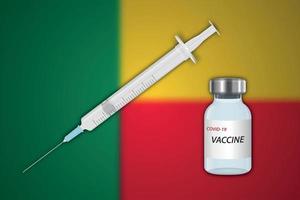 seringue et flacon de vaccin sur fond flou avec le drapeau du bénin, vecteur