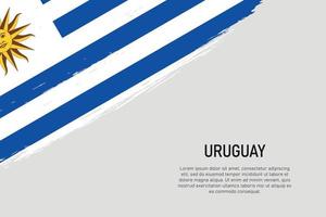 fond de coup de pinceau de style grunge avec le drapeau de l'uruguay vecteur