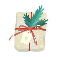 cadeau de noël, décoré de plantes, de rubans et de papier d'emballage recyclé vecteur