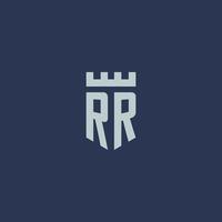 monogramme du logo rr avec un château de forteresse et un design de style bouclier vecteur