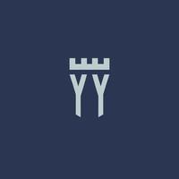 monogramme du logo yy avec un château de forteresse et un design de style bouclier vecteur