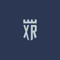 monogramme du logo xr avec un château de forteresse et un design de style bouclier vecteur