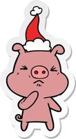 caricature d'autocollant d'un cochon en colère portant un bonnet de noel vecteur