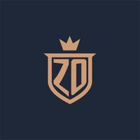 logo initial monogramme zo avec style bouclier et couronne vecteur