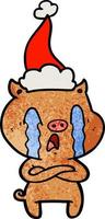 dessin animé texturé de cochon qui pleure d'un bonnet de noel vecteur