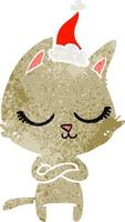 dessin animé rétro calme d'un chat portant un bonnet de noel vecteur