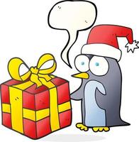 Bulle de dialogue dessinée à main levée dessin animé pingouin de Noël avec présent vecteur