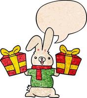 lapin de dessin animé et cadeaux de noël et bulle de dialogue dans un style de texture rétro vecteur