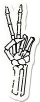 tatouage d'autocollant en détresse dans le style traditionnel d'un squelette donnant un signe de paix vecteur