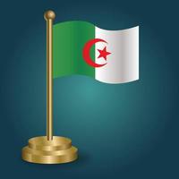 drapeau national de l'algérie sur le poteau d'or sur fond sombre isolé de gradation. drapeau de table, illustration vectorielle vecteur
