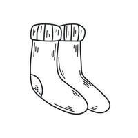 paire de chaussettes en laine illustration de doodle isolé vecteur