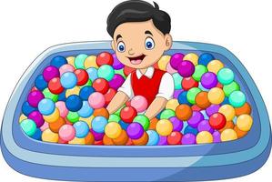 enfant jouant avec des balles colorées dans le bain vecteur