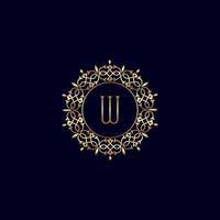 w logo de luxe royal orné d'or vecteur