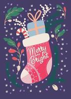 joyeux noël et nouvel an carte de lettrage à la main sur une chaussette cadeau avec canne en bonbon et étoiles. illustration vectorielle festive colorée vecteur